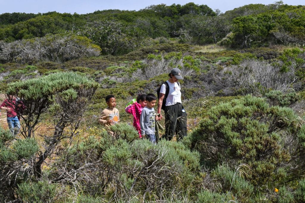 UCSC FONR Student Employee Nicole Gramlich hiking with Kindergarteners from Marina, CA at Fort Ord Natural Reserve